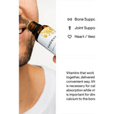 Man holding Thorne Vitamin D + K2 Liquid, highlighting benefits for bone and heart health.